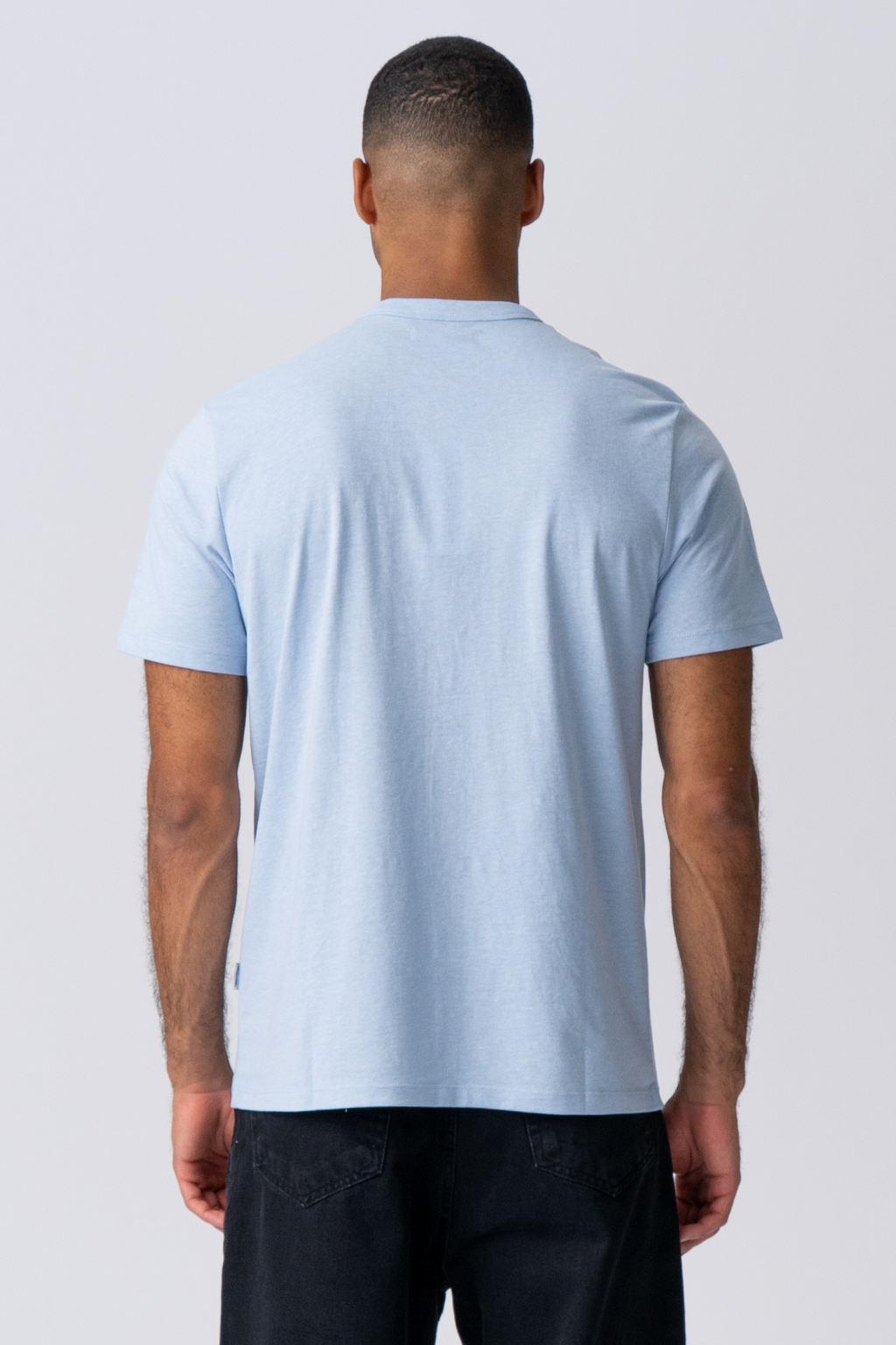 T-shirt med ficka - Ljusblå